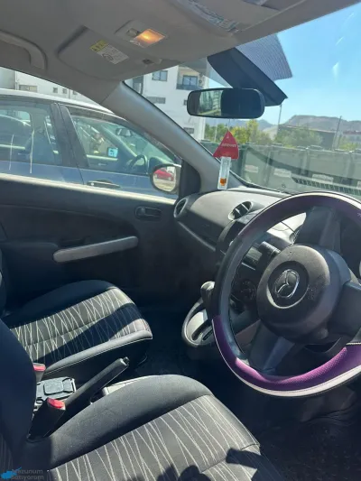 Mazda Demio "masrafsiz"